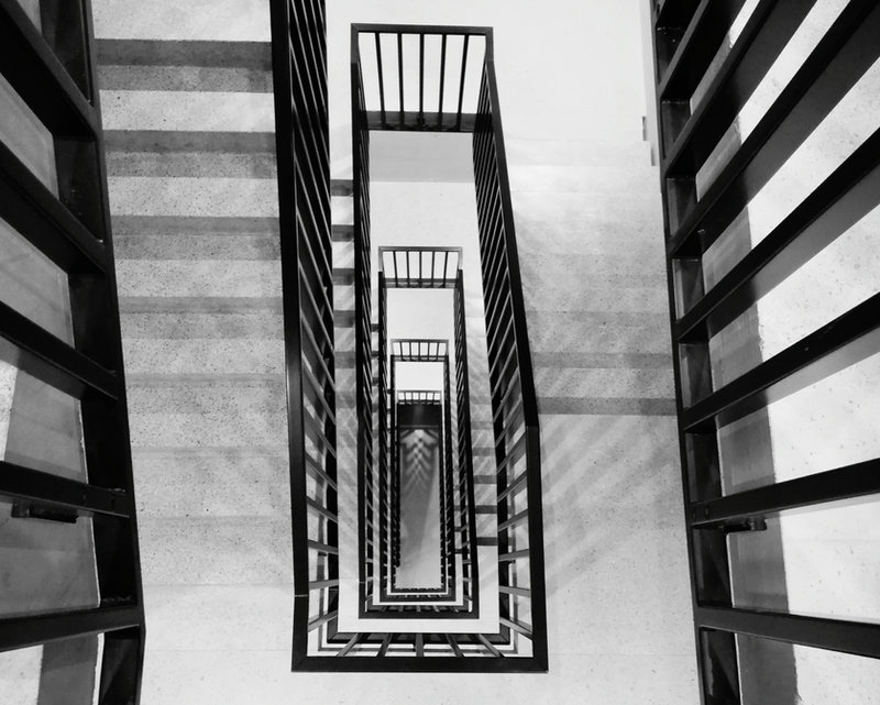 User navigating stairs safely with active optics eyewear eliminating floor distortion